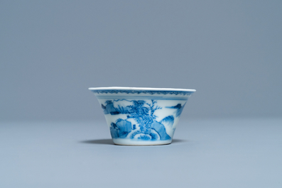 A Chinese blue and white inscribed wine cup, Kangxi
